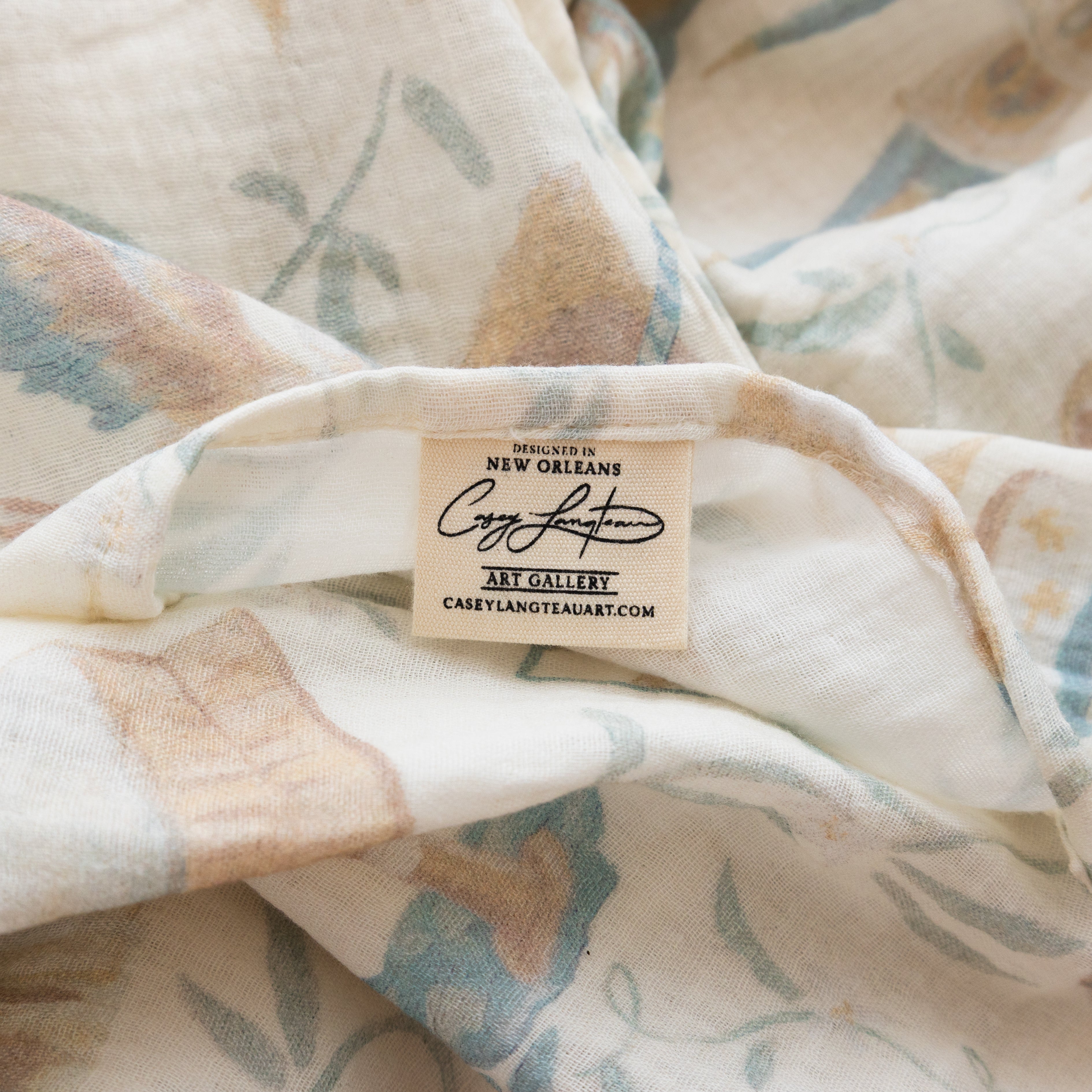 Raised on Beignets Swaddle